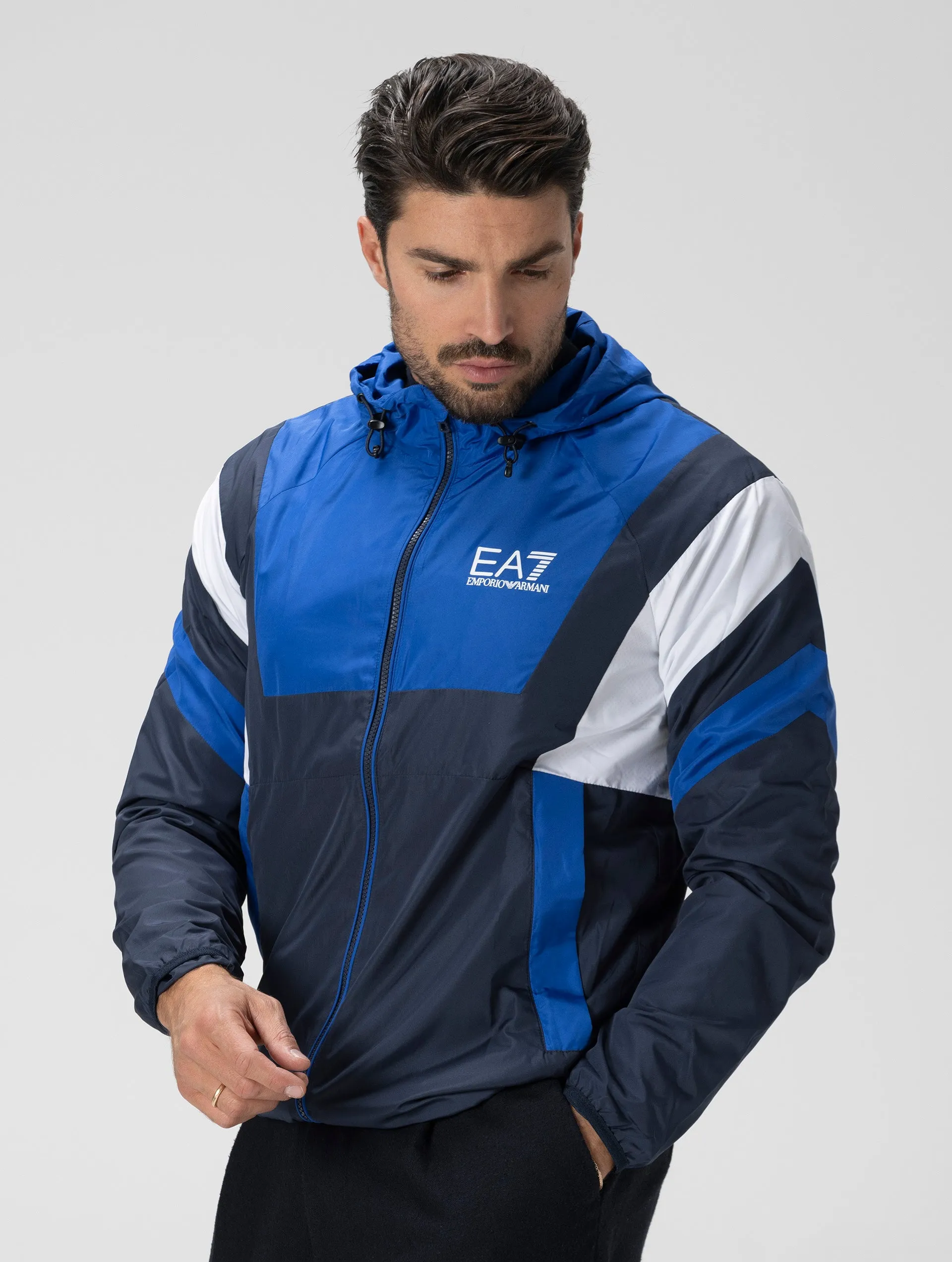 EA7 WATERPROOF JACKET IN BLUE AND WHITE